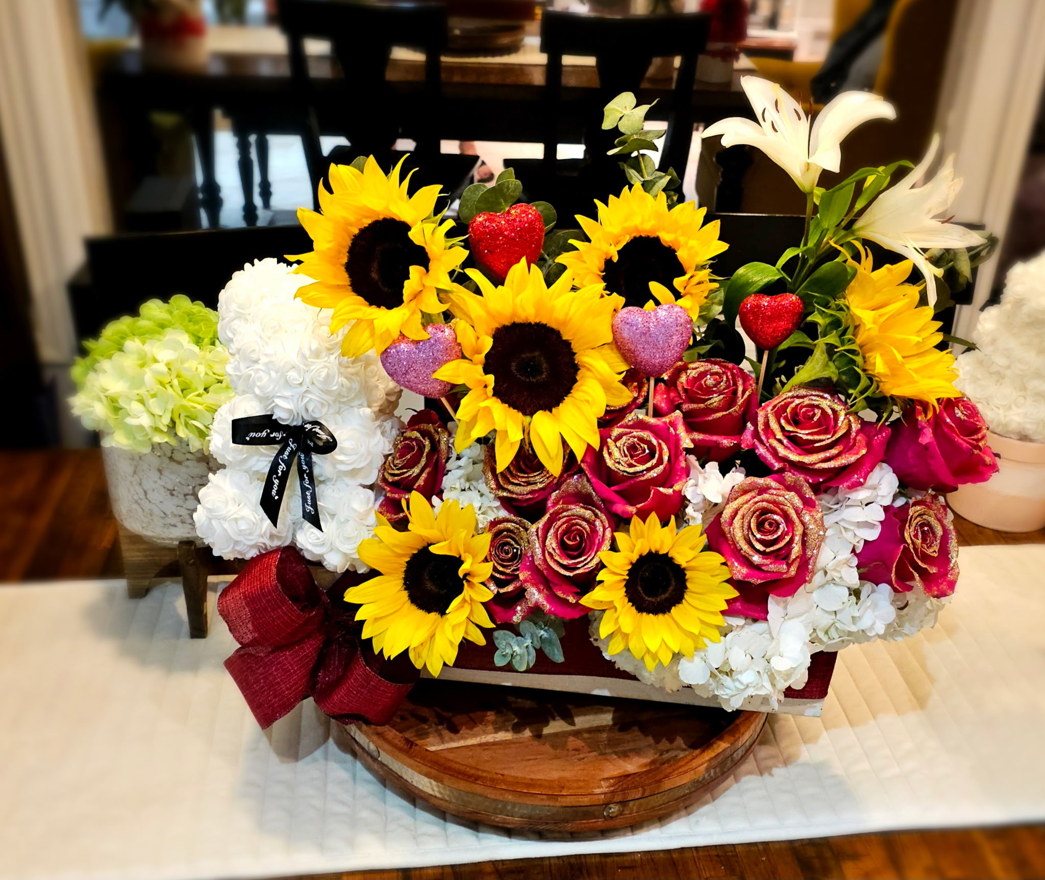 Sunflowers with gold roses arrangement